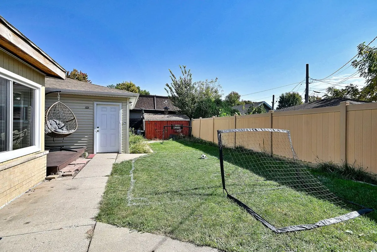 7167 N Ozanam Avenue